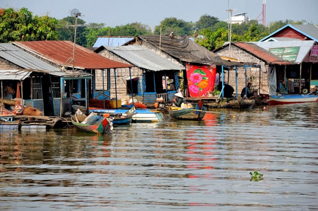 Discover the beauty of Cambodia's famous Tonle Sap Lake on our Floating Village Tour from Siem Reap. This relaxing half-day experience takes you to the remarkable floating village of Chong Khneas, where you'll explore floating schools, local markets, fishing communities, and traditional life on Southeast Asia's largest freshwater lake. Floating Village Tour Overview Your morning begins with hotel pickup in Siem Reap before traveling in a comfortable air-conditioned vehicle to Tonle Sap Lake. On the way, you'll stop to admire Cambodia's beautiful lotus fields. These colorful flowers hold deep cultural and religious significance in Buddhism, making them a perfect photo opportunity before continuing to the lake. Explore Chong Khneas Floating Village Board your private boat and cruise through Chong Khneas Floating Village, one of the largest floating communities on Tonle Sap Lake. Your experienced English-speaking guide will explain how Khmer, Vietnamese, and Cham families have adapted to life on the water for generations. Discover how homes, schools, churches, temples, shops, and markets float with the changing water levels throughout the year. Visit Floating Schools and Fish Farms Continue your journey by visiting the floating crocodile and fish farm, where you'll learn about traditional fishing practices and the importance of Tonle Sap Lake to Cambodia's economy. You'll also pass floating schools and community buildings, providing a fascinating insight into everyday life on the lake. Relax Aboard the Queen Tara Next, step aboard the famous Queen Tara, the largest boat on Tonle Sap Lake. Relax on the spacious viewing deck while enjoying complimentary drinks and taking in breathtaking panoramic views across the Great Lake. You can also unwind in one of the comfortable hammocks as you experience the peaceful atmosphere of Tonle Sap. Discover Tonle Sap Wildlife Tonle Sap Lake is one of Southeast Asia's richest ecosystems. Depending on the season, you may spot painted storks, spot-billed pelicans, herons, kingfishers, and many other native bird species. The surrounding wetlands offer outstanding opportunities for wildlife photography and nature lovers. Return to Siem Reap After approximately three hours exploring the floating village and Tonle Sap Lake, you'll return comfortably to your hotel in Siem Reap with unforgettable memories of Cambodia's unique floating communities.